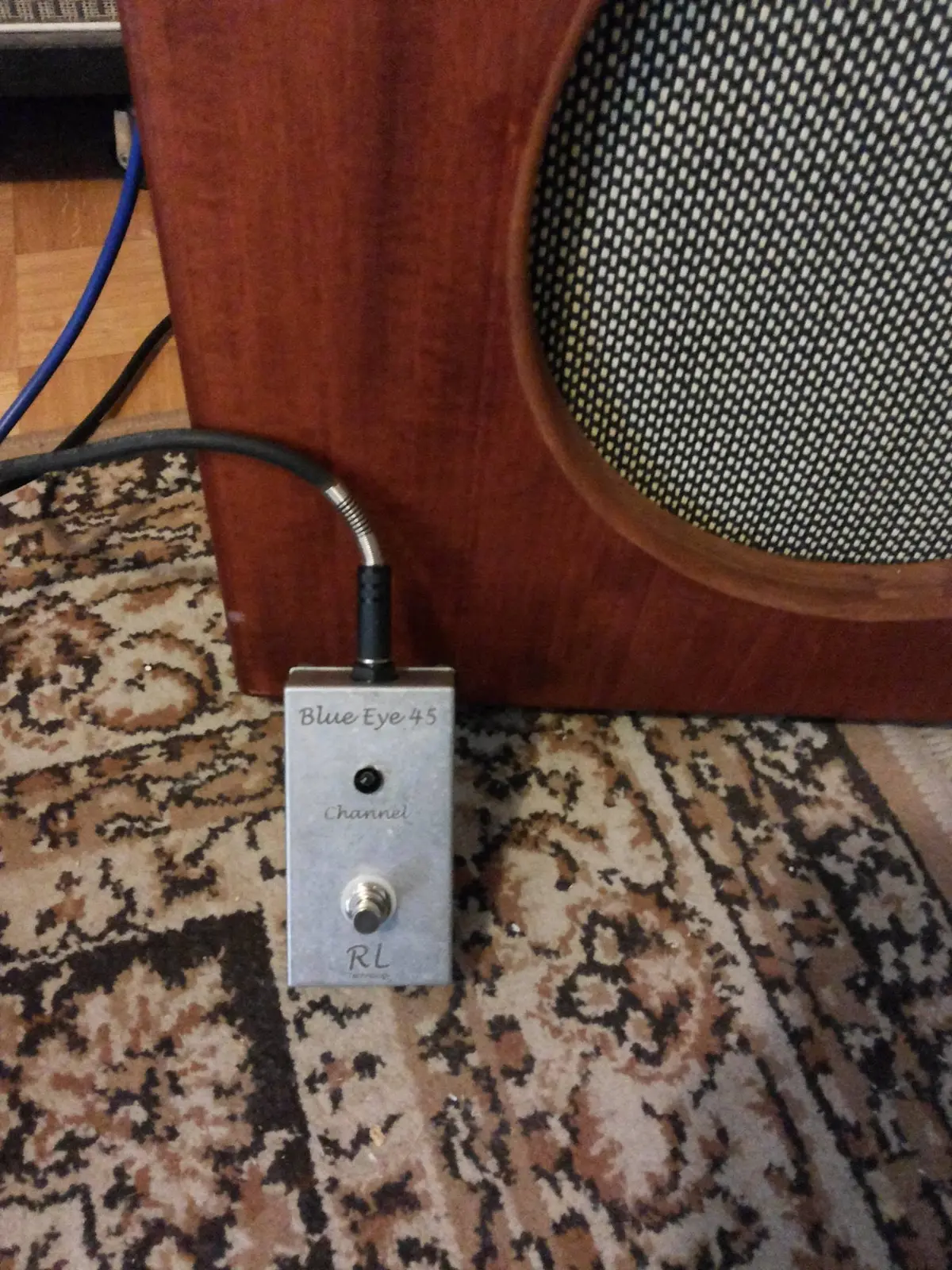 Blue Eye Dual Channel footswitch beside the combo